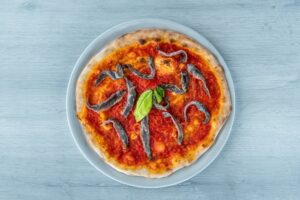Το πείραμα πέτυχε! : Γαύρος αντί για κρέας σε πίτσα, burger και τοστ από Fast food